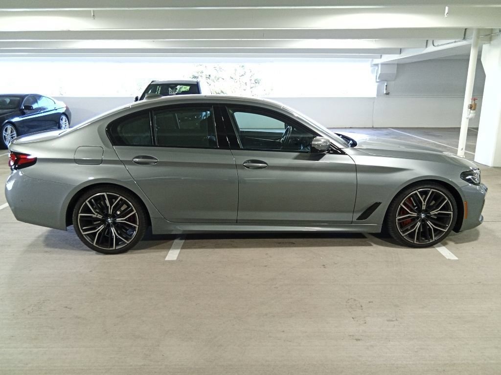 Used 2023 Skyscraper Gray Metallic BMW M550i xDrive image 4