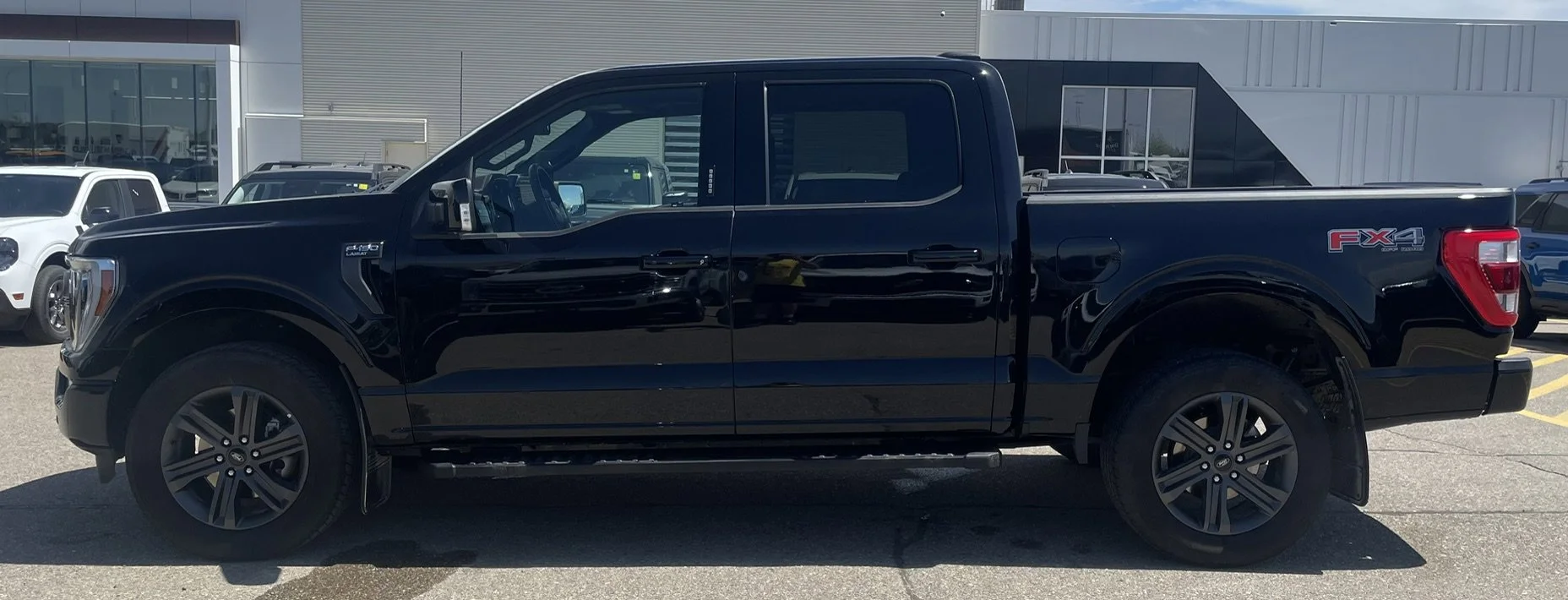 Used 2023 Black Ford LARIAT SuperCrew   **New Arrival** image 2