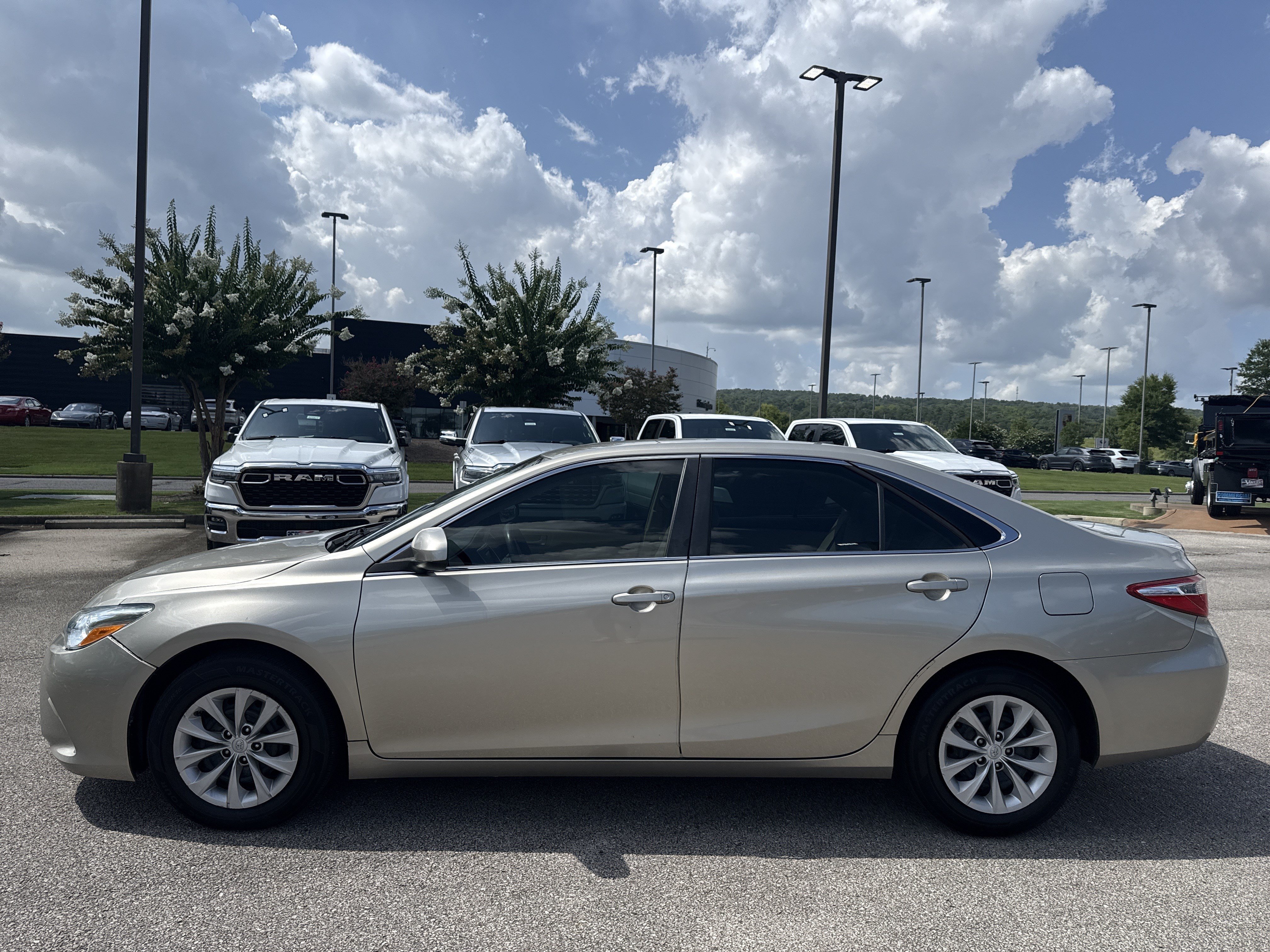 Used 2015 Gold Toyota LE image 4