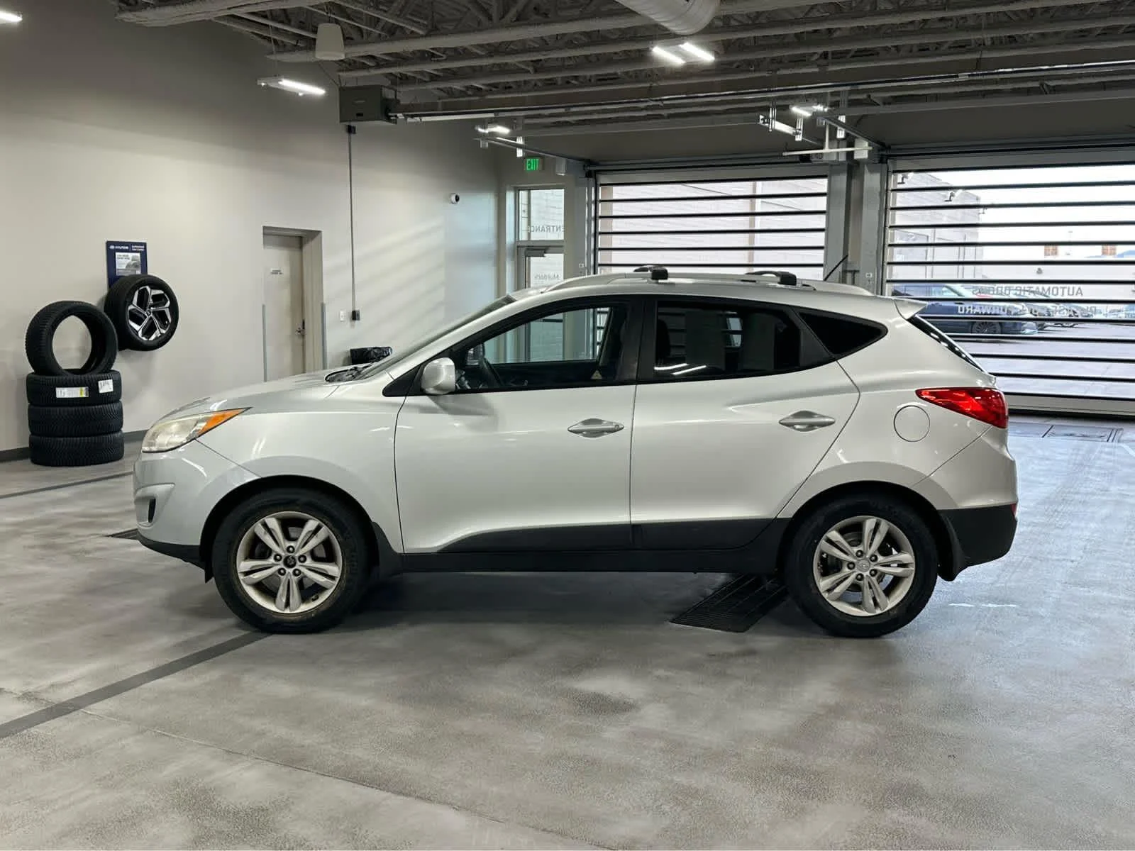 Used 2011 Hyundai Tucson GLS with VIN KM8JUCACXBU315236 for sale in Murray, UT
