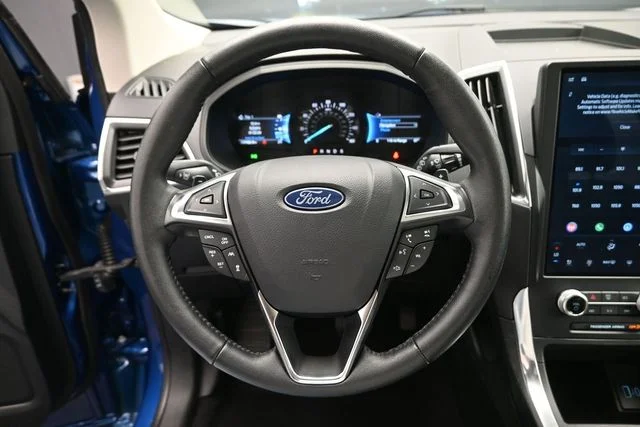 Certified Used 2024 Atlas Blue Metallic Ford Titanium image 15