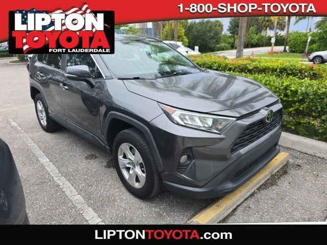 Used 2021 Magnetic Gray Metallic Toyota XLE image 1