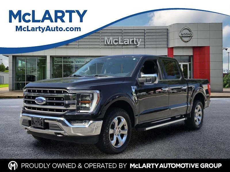 Used 2021 Black Metallic FORD LARIAT 4WD SUPERCREW 5.5