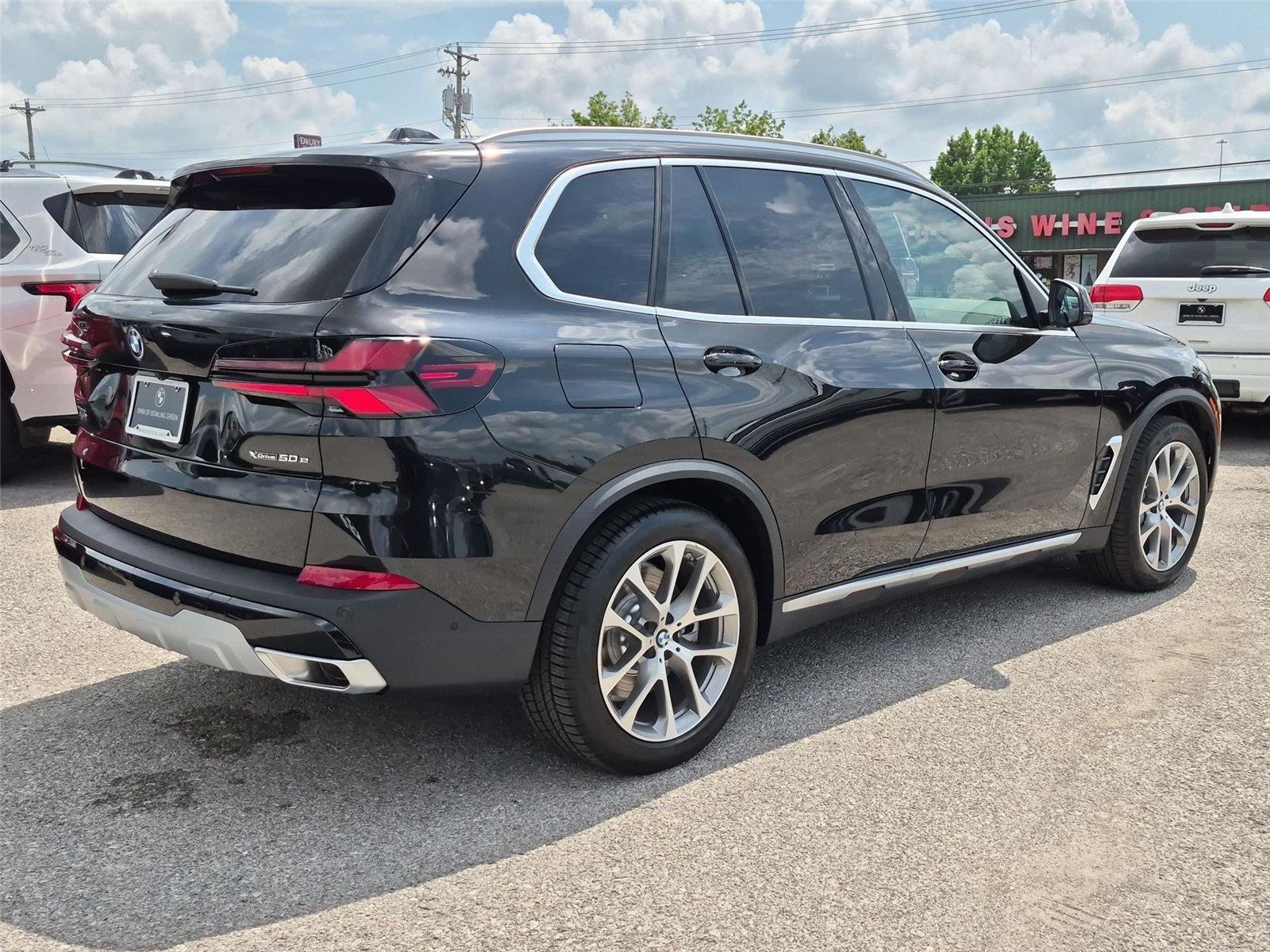 New 2026 Black Sapphire Metallic BMW xDrive50e image 5