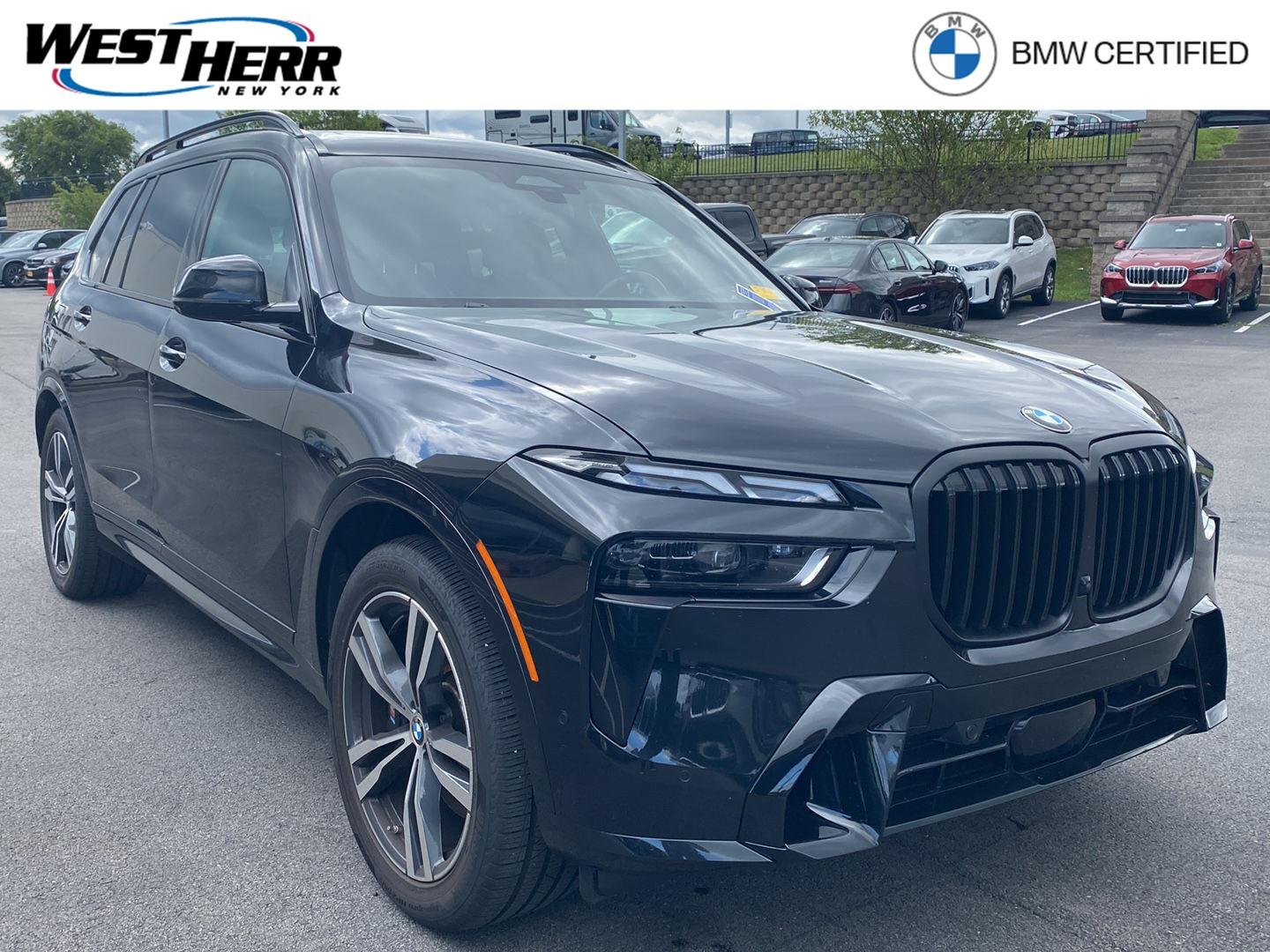 Certified Used 2024 Black Sapphire Metallic BMW xDrive40i image 1