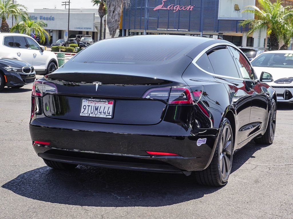 Used 2019 Solid Black Tesla Standard Range Plus image 5