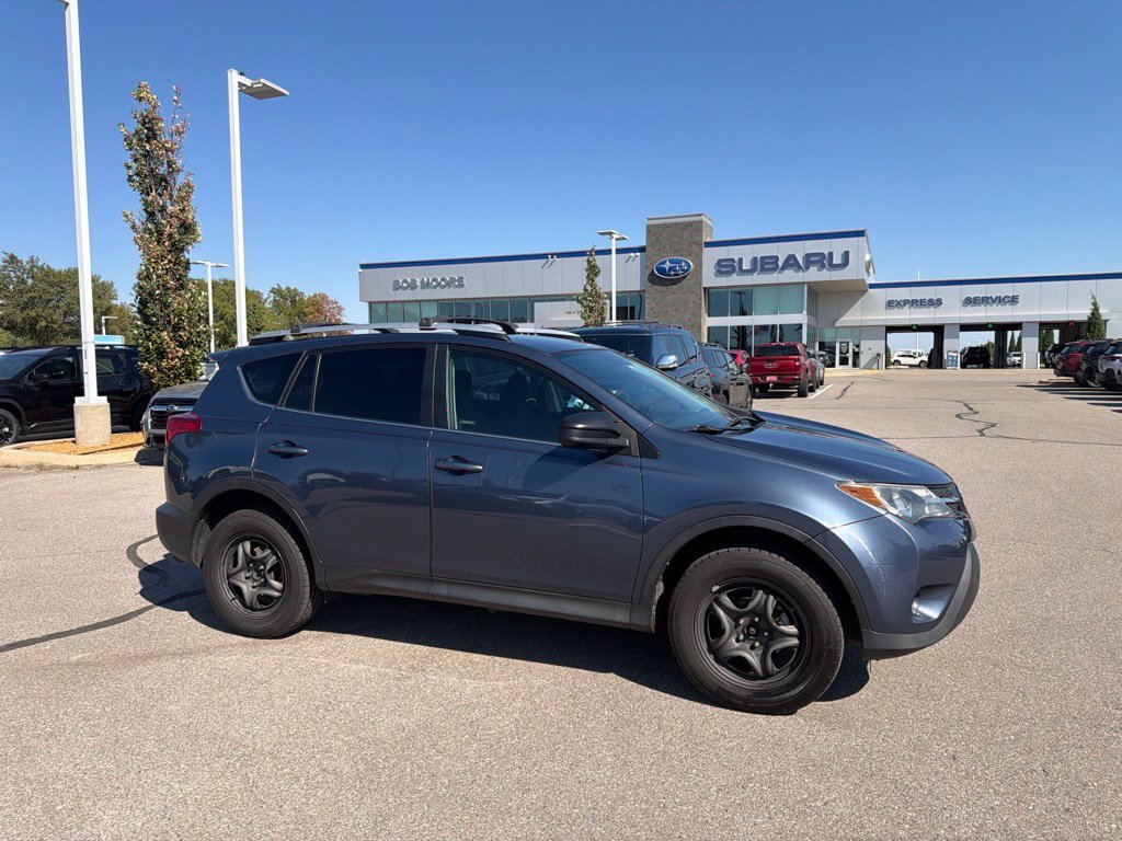 Used 2014 Blue Toyota LE image 1