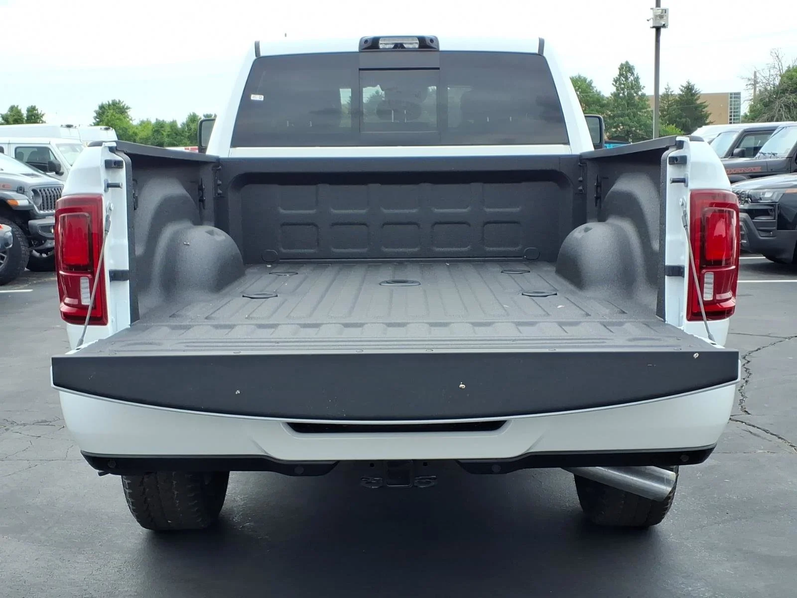 New 2026 Bright White Clear-Coat Exterior Paint RAM Laramie image 18