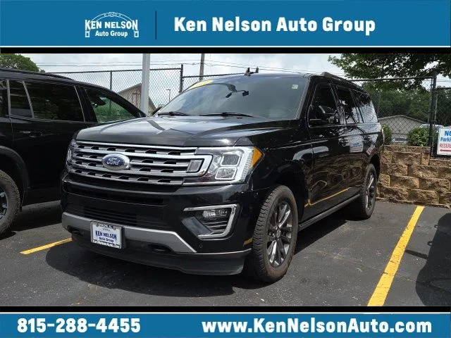 Used 2021 Black Metallic Ford Limited image 1