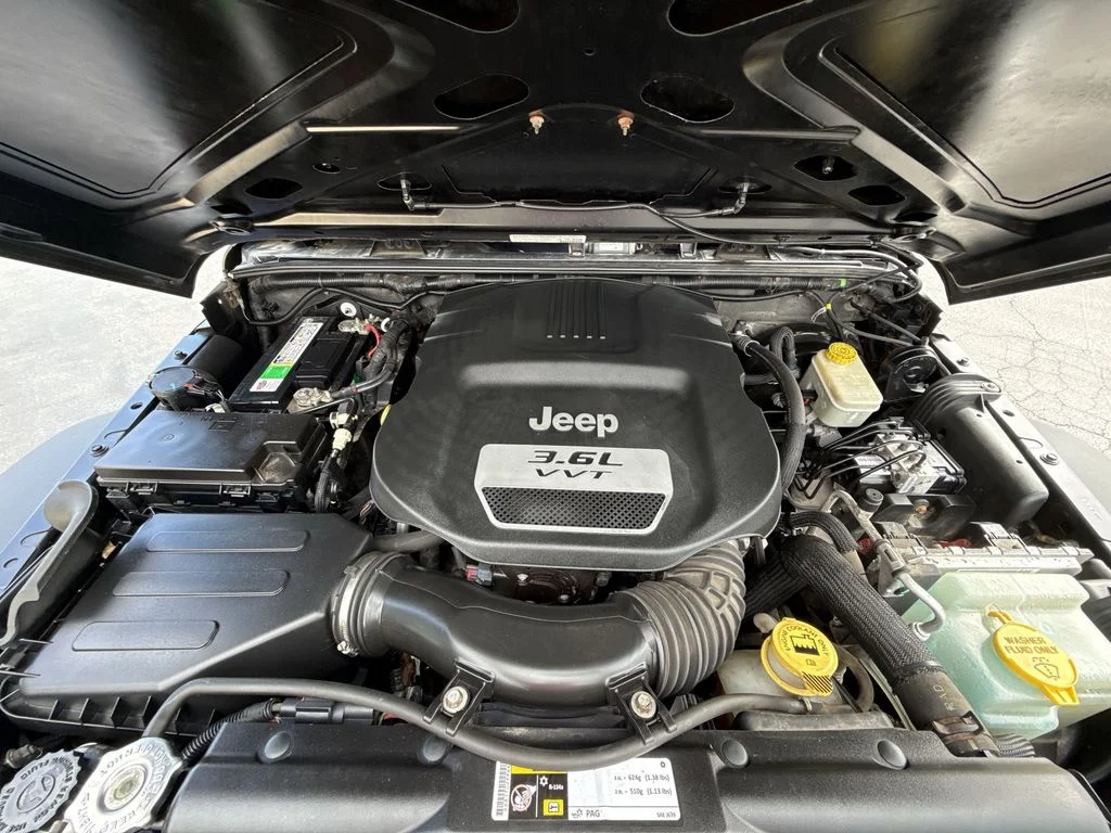 Used 2013 Black Jeep Unlimited Sport image 26