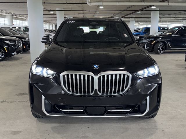 Used 2025 Black Sapphire Metallic BMW sDrive40i image 3