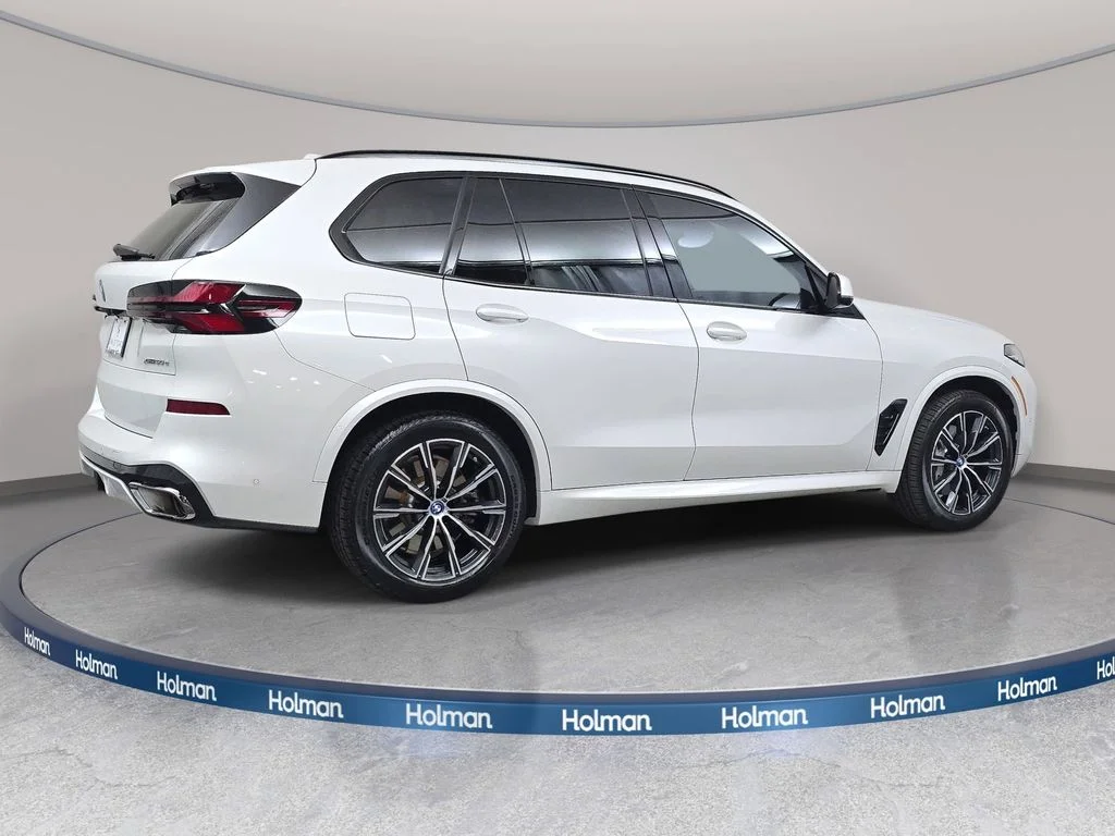 Used 2024 Mineral White Metallic BMW xDrive50e image 4