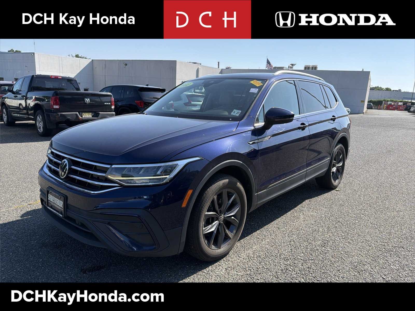 Used 2022 Atlantic Blue Metallic Volkswagen SE image 1