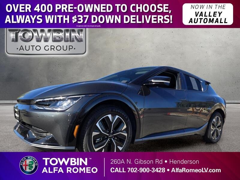 Used 2023 CHARCOAL KIA WIND RWD image 1