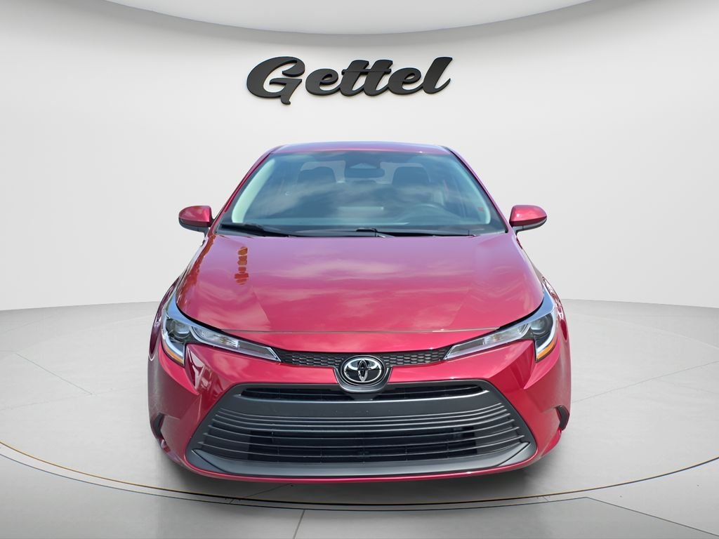 Used 2026 Red Toyota LE image 2