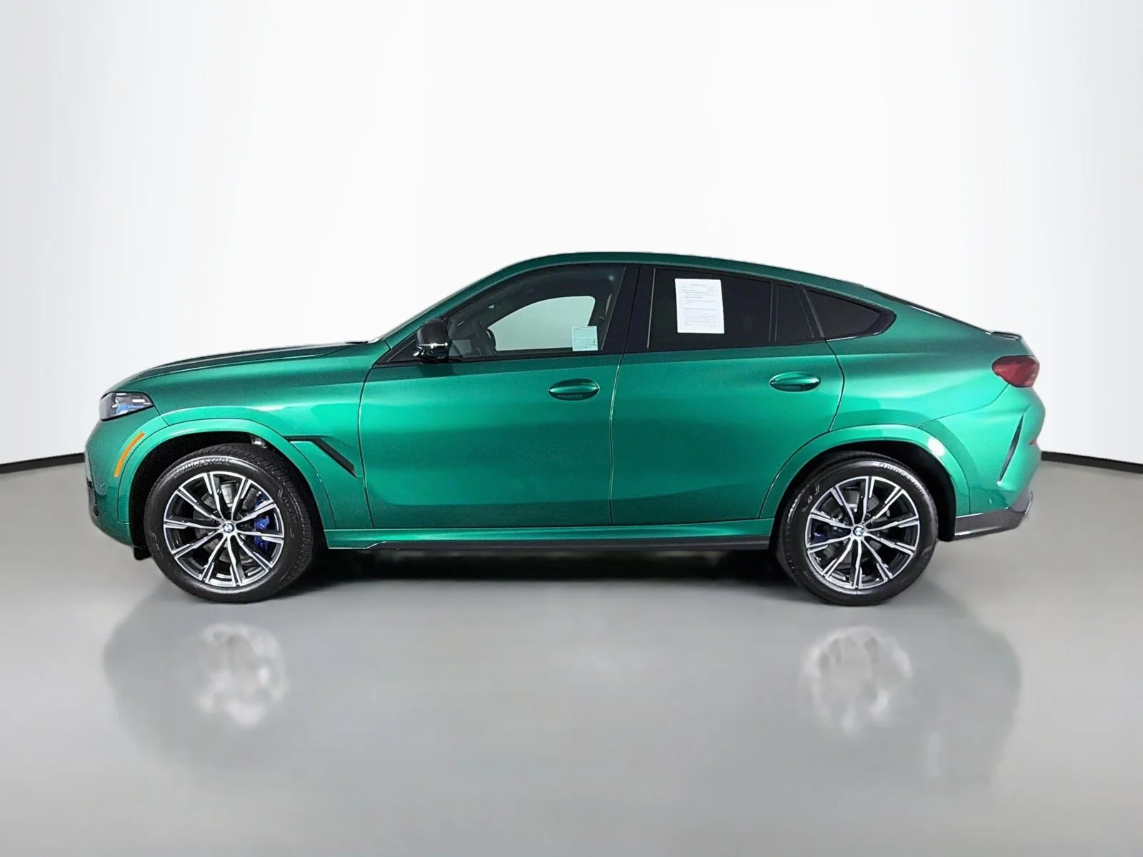Used 2027 Isle of Man Green Metallic BMW M60i image 4