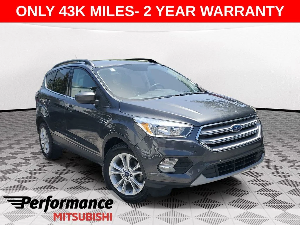 Used 2018 Gray Ford SE image 1