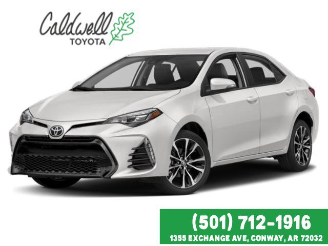 Used 2019 Super White Toyota LE image 1
