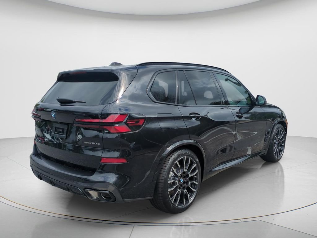 New 2026 Black Sapphire Metallic BMW xDrive50e image 12