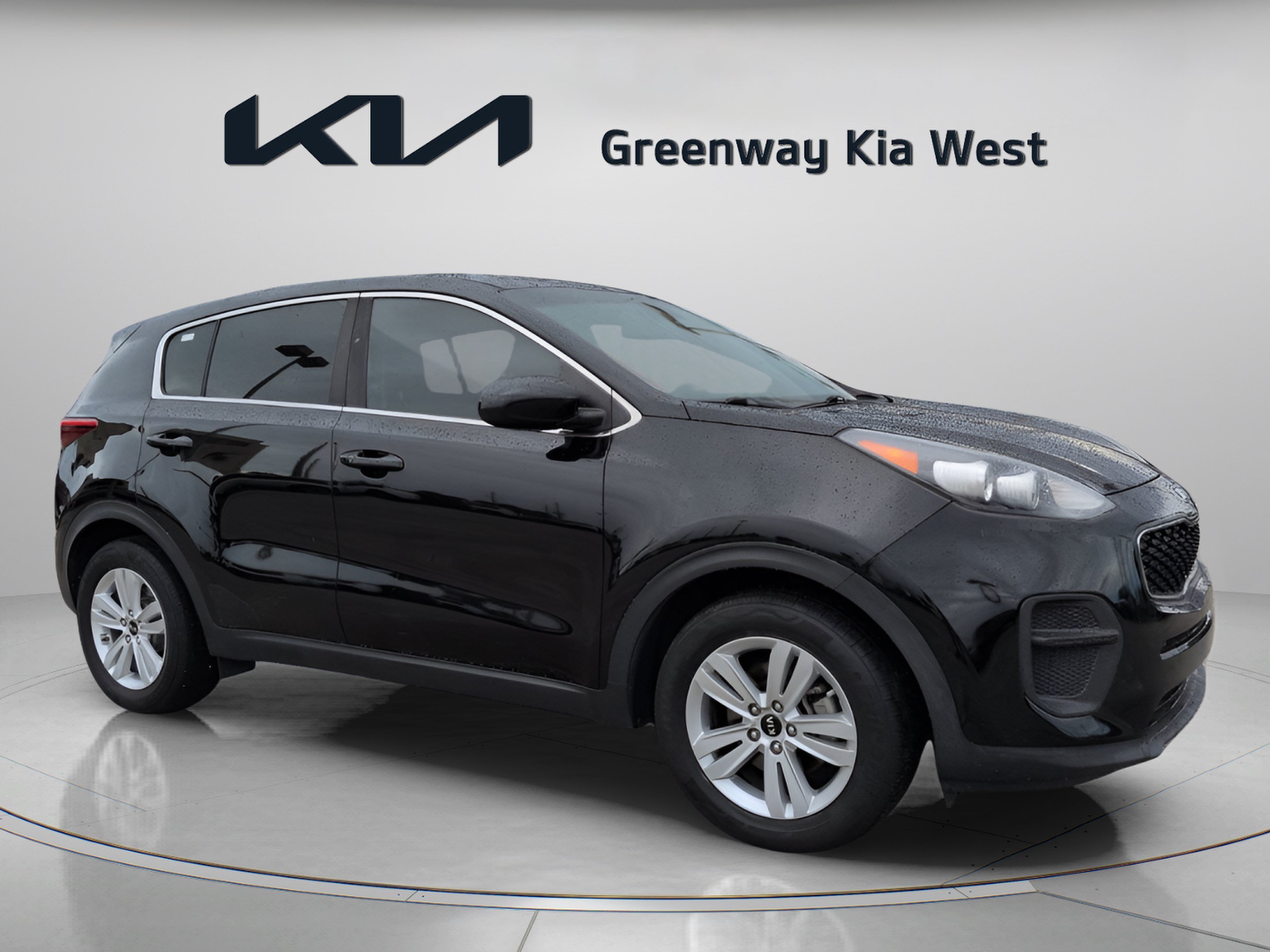 Used 2018 Black Cherry Kia LX image 1