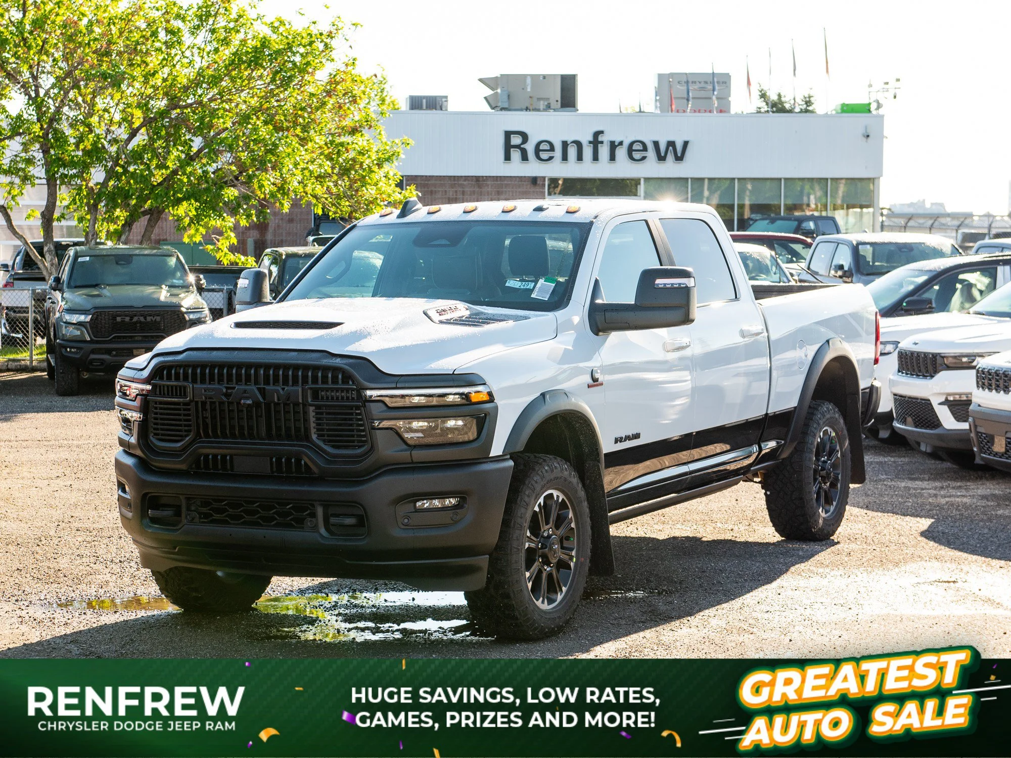 New 2026 White RAM Rebel* Crew Cab 4x4, 6.7L Cummins, Sunroof, 34 Inch A/T Tires image 1