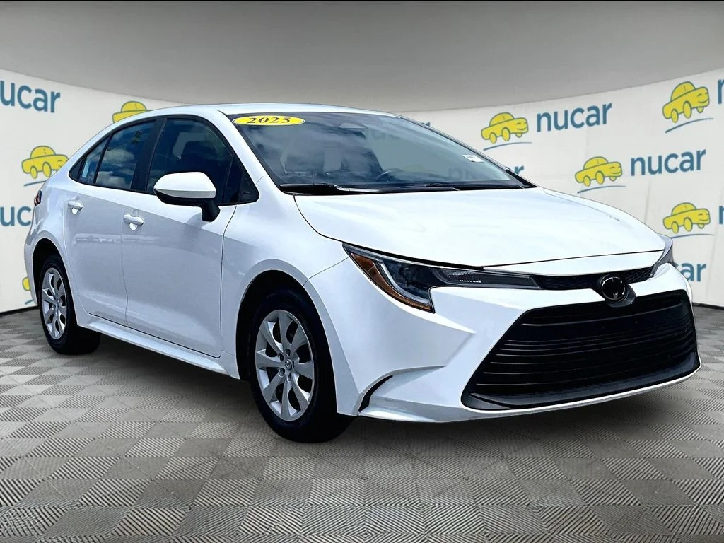 Used 2025 White Toyota LE image 1