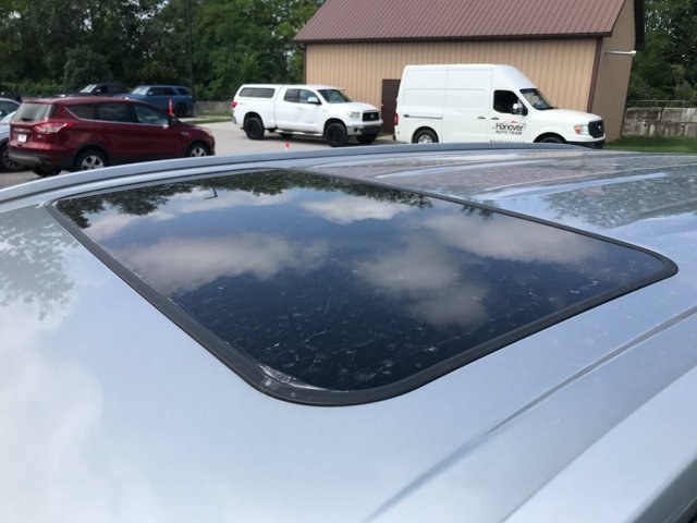 Used 2022 Celestial Silver Metallic Toyota Hybrid XLE image 4