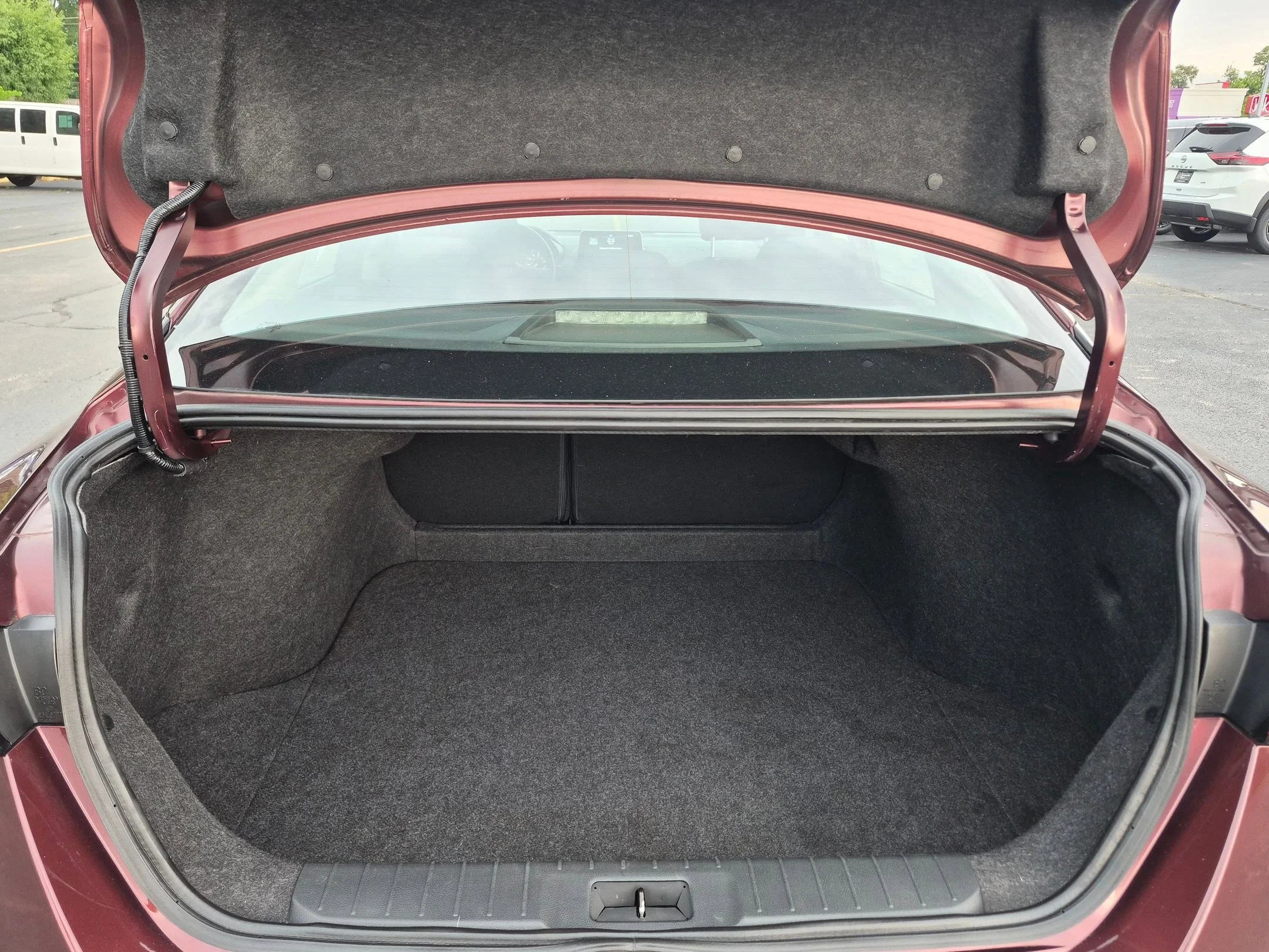 Used 2024 Rosewood Metallic Nissan SV image 23