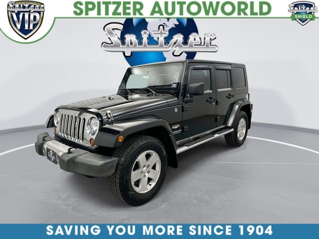 Used 2009 Black Jeep Unlimited Sahara image 5