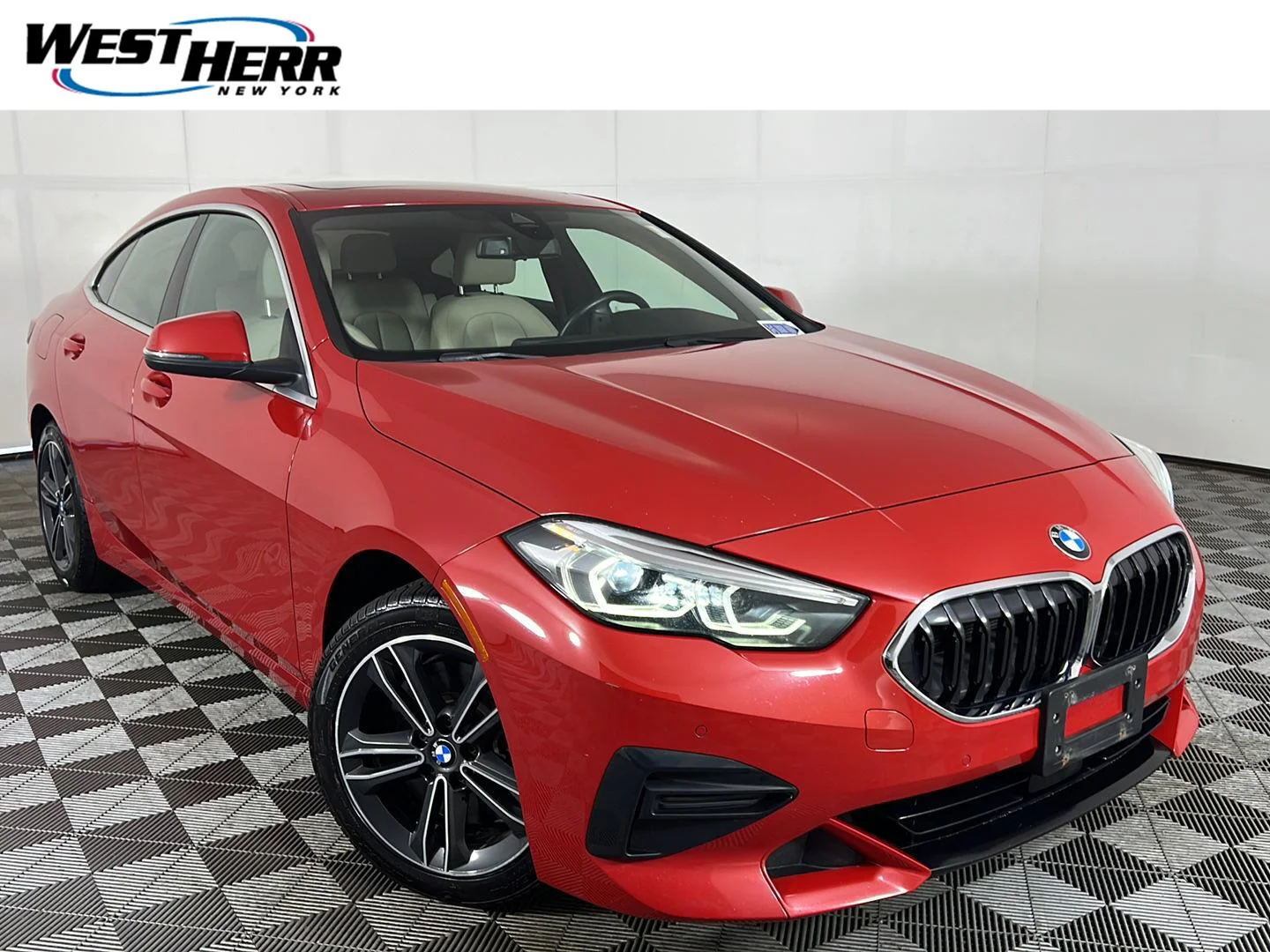 Used 2022 Melbourne Red Metallic BMW 228i xDrive image 1