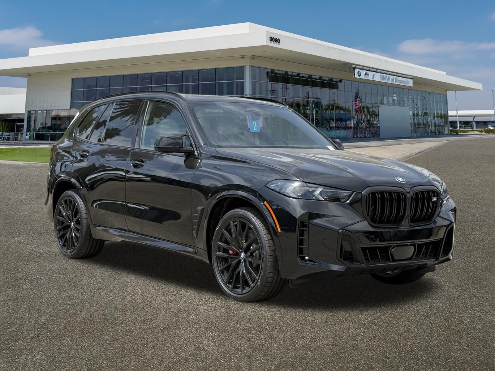 New 2026 Black Sapphire Metallic BMW M60i image 2