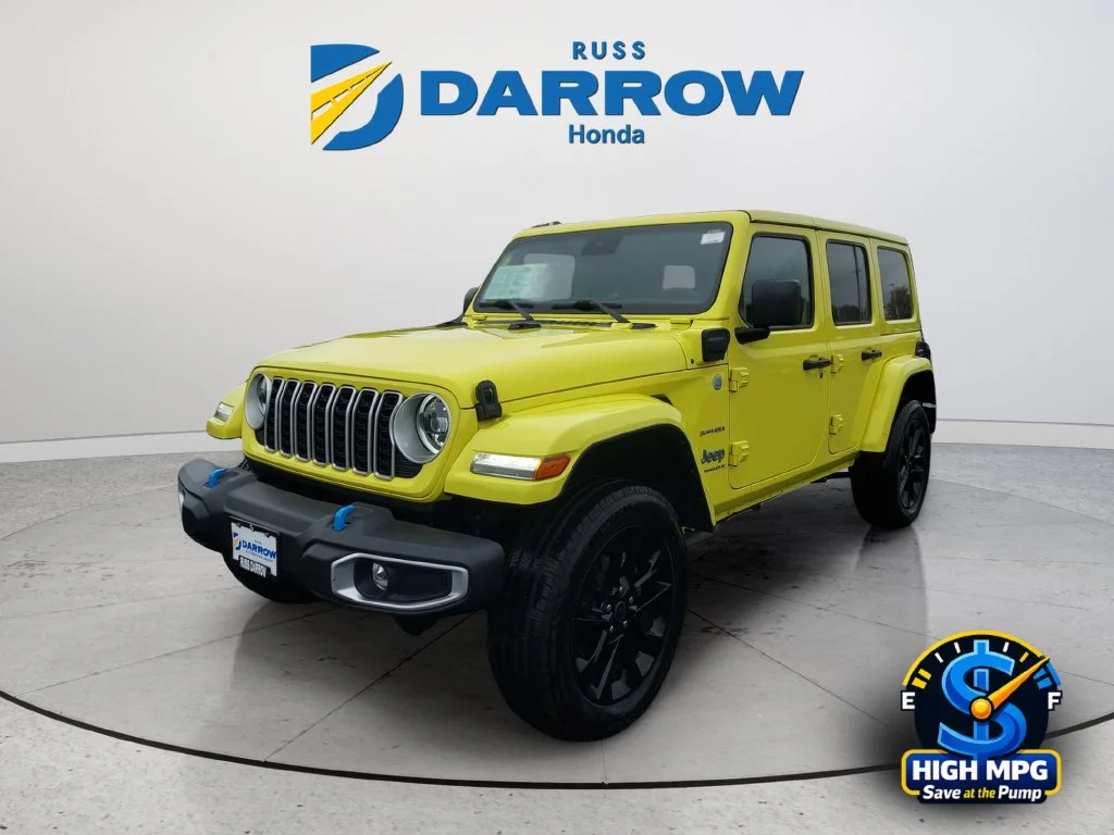 Used 2024 Yellow Jeep Sahara 4xe image 1