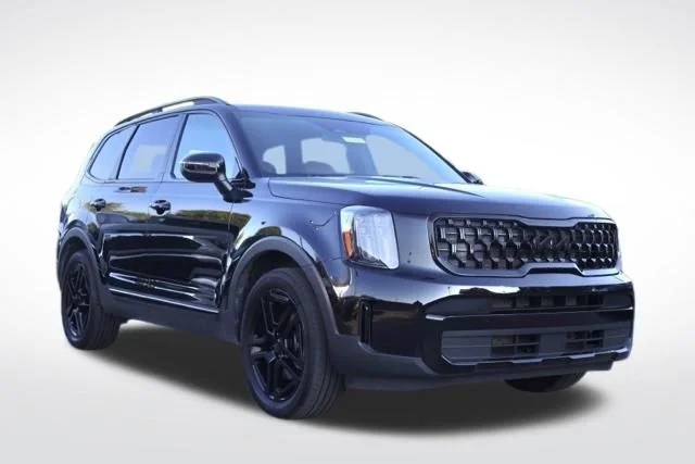 Used 2025 Black Kia EX X-Line image 1
