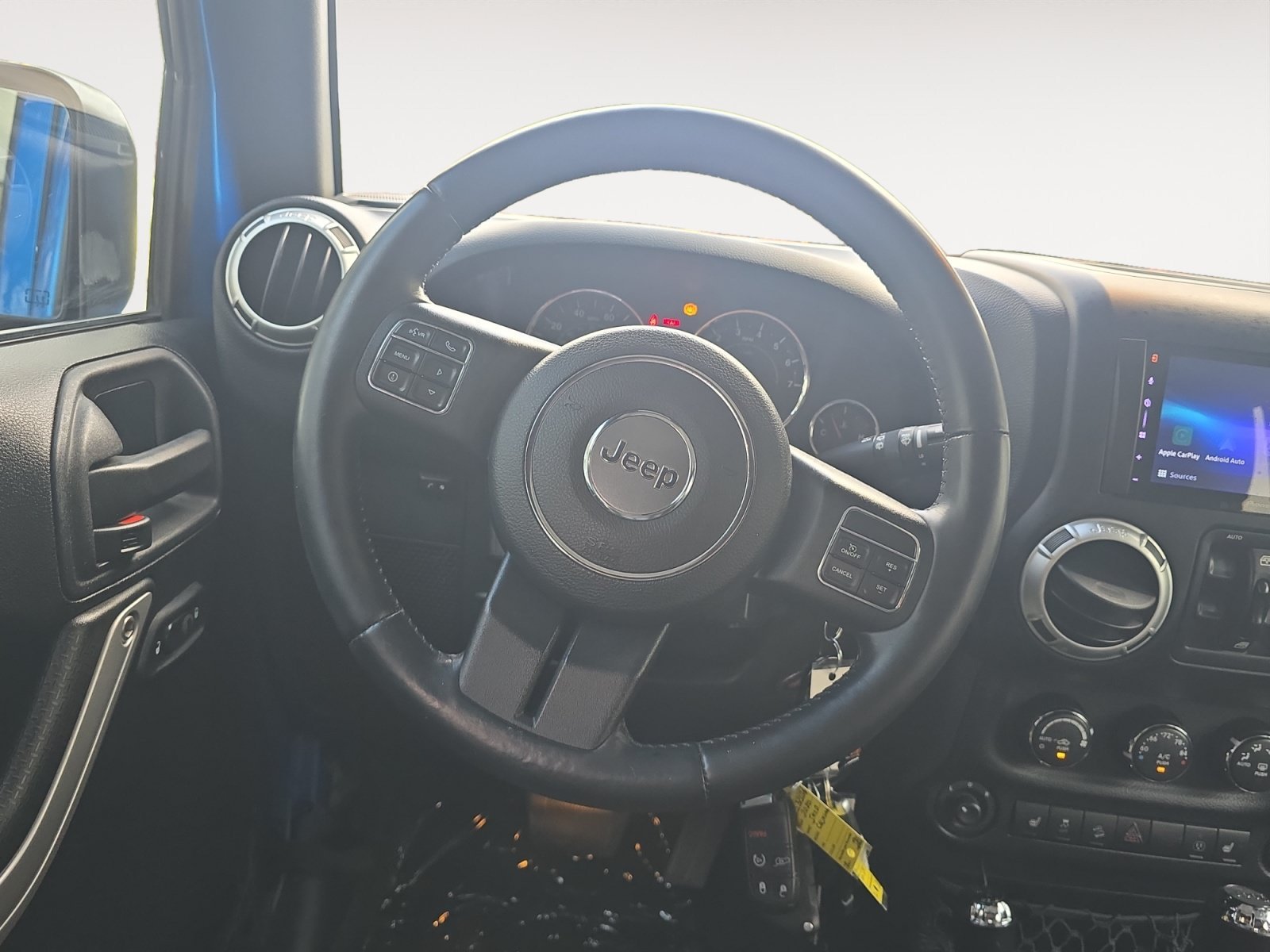 Used 2015 Hydro Blue Pearl Coat Jeep Sahara image 13