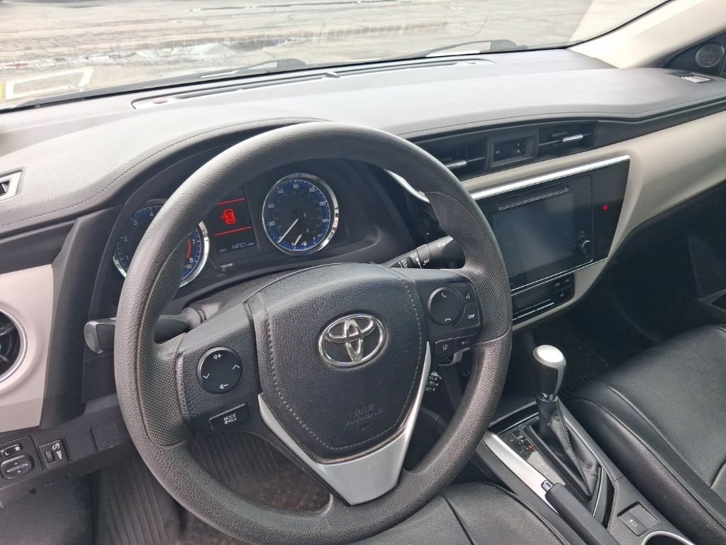 Used 2019 Classic Silver Metallic Toyota LE image 7