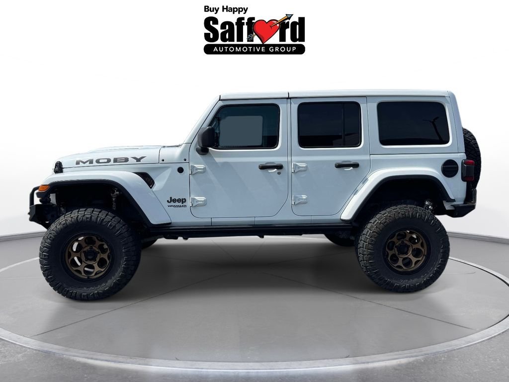 Used 2019 White Jeep Unlimited Sahara image 4