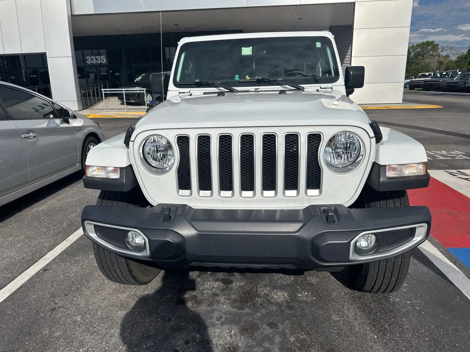 Used 2019 White Jeep Unlimited Sahara image 2