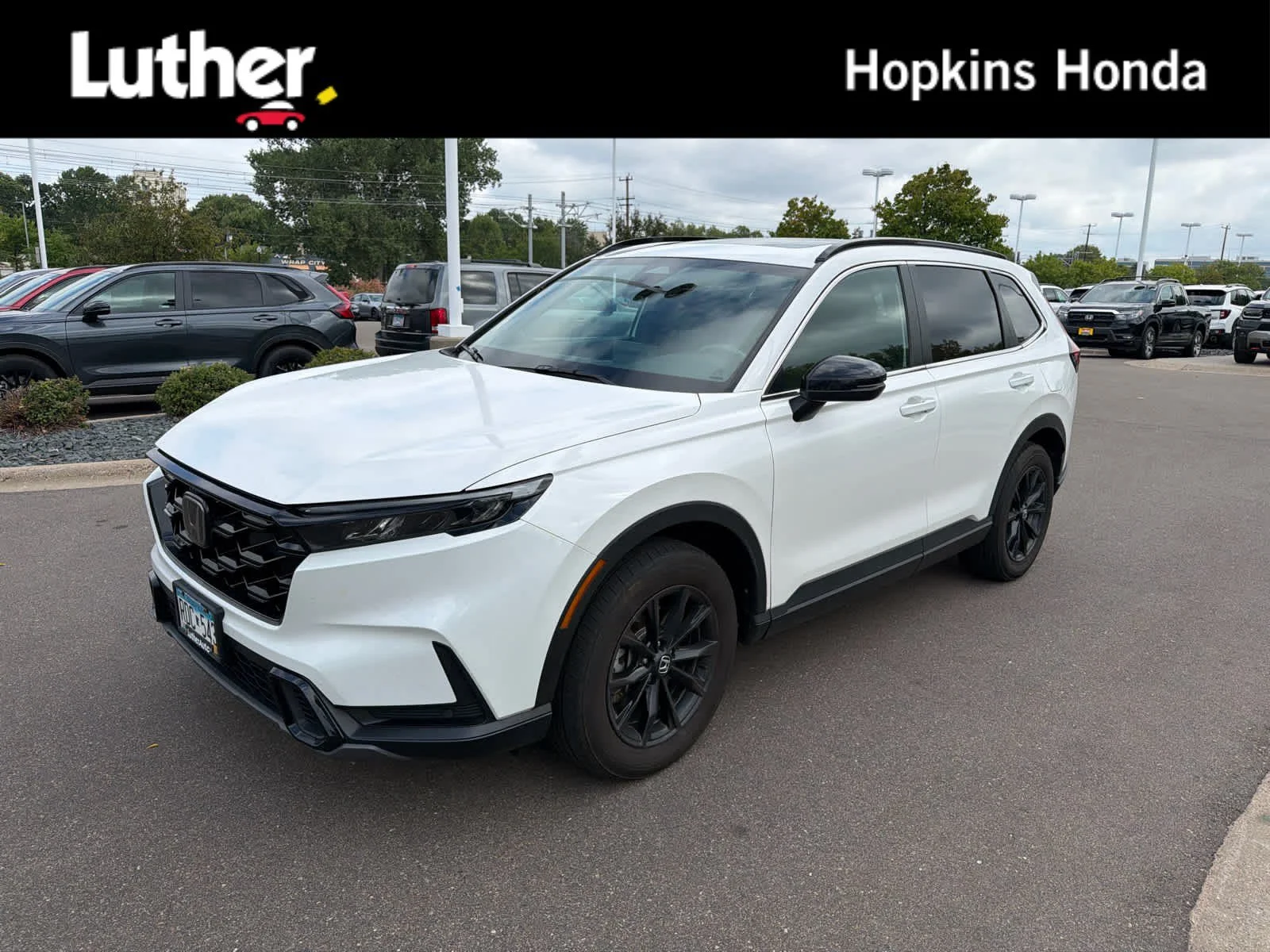 Certified Used 2025 Platinum White Pearl Honda Sport-L image 1