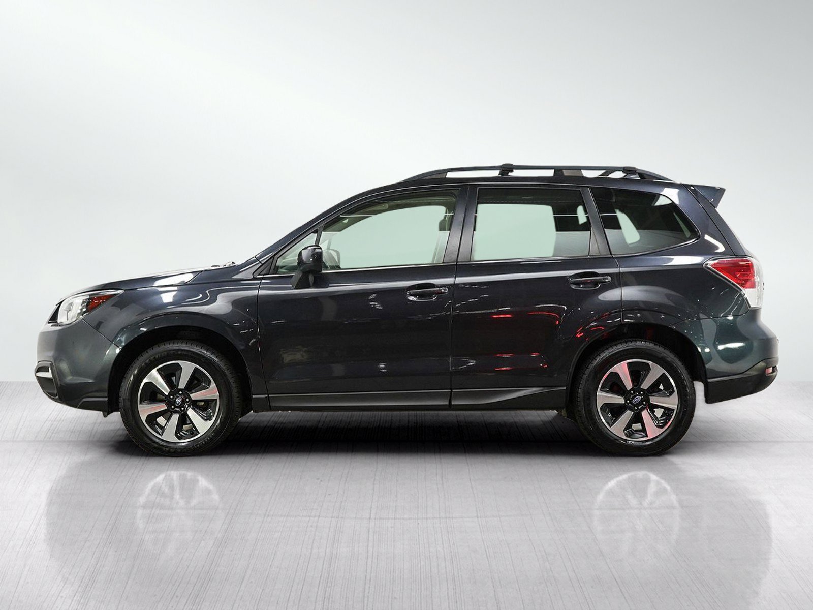 Used 2017 Subaru Forester Limited with VIN JF2SJAJC9HH411206 for sale in Burnsville, Minnesota