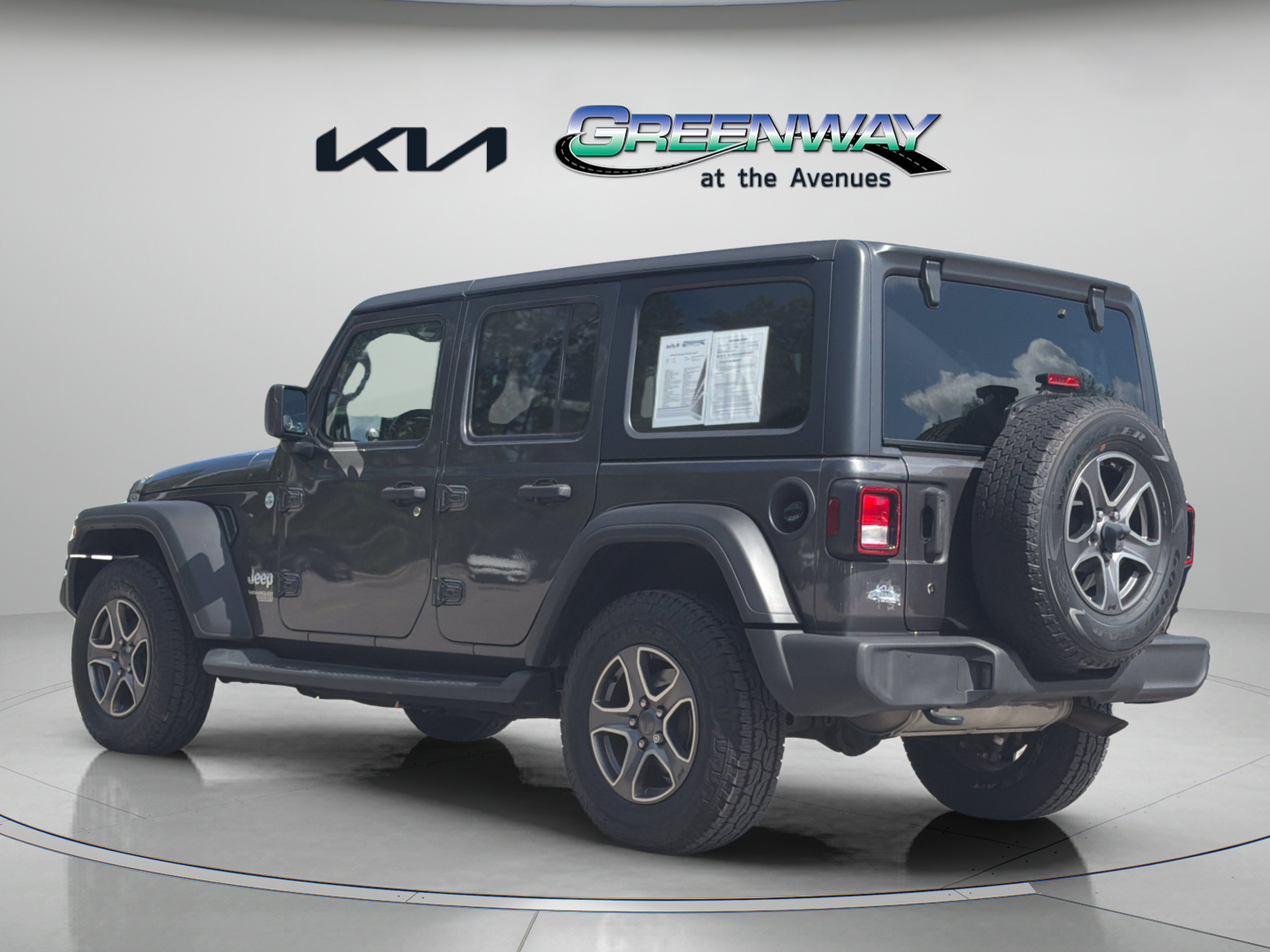 Used 2018 Granite Crystal Metallic Clearcoat Jeep Sport S image 3