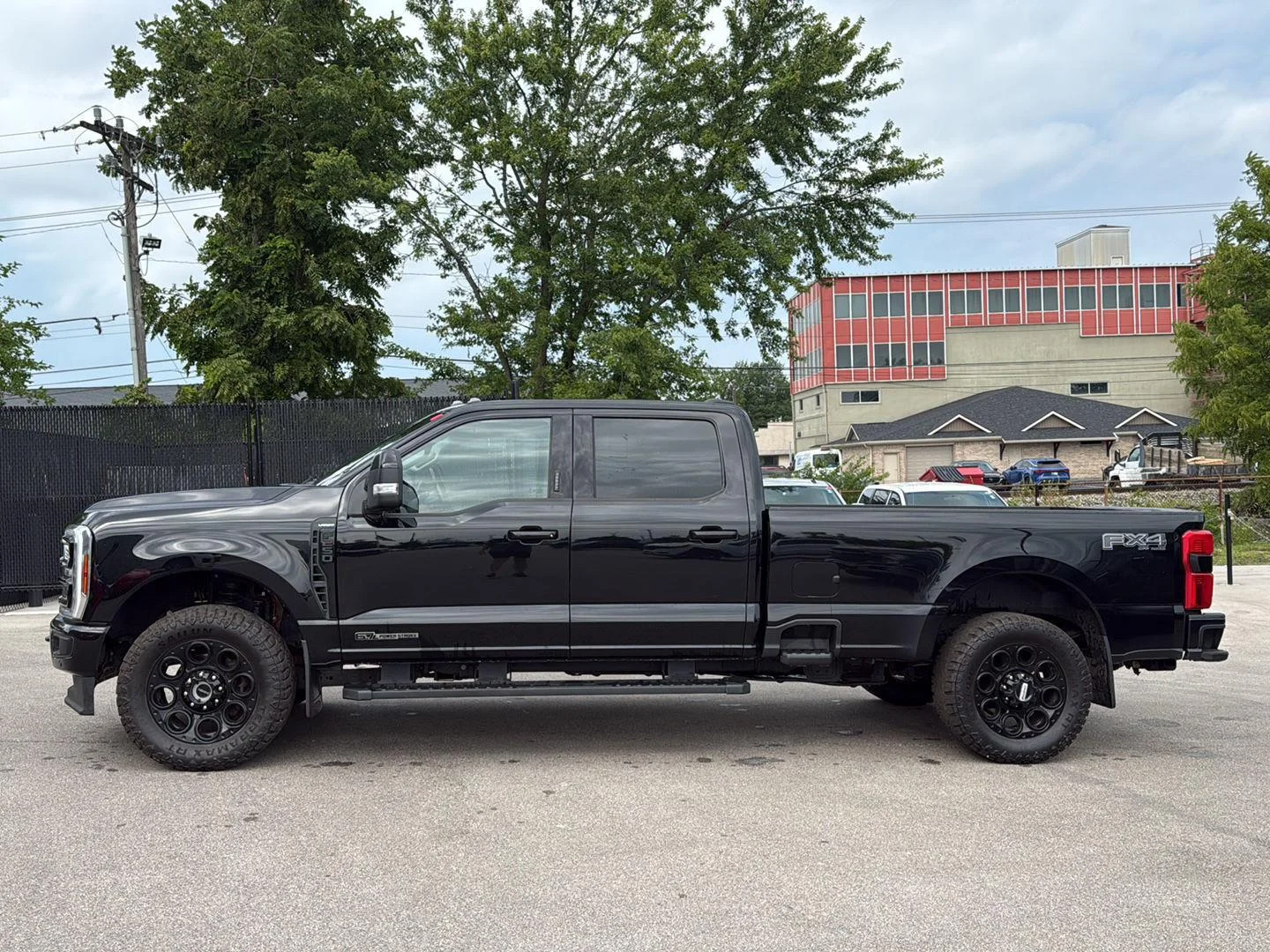 Used 2024 Agate Black Metallic Ford Lariat image 6