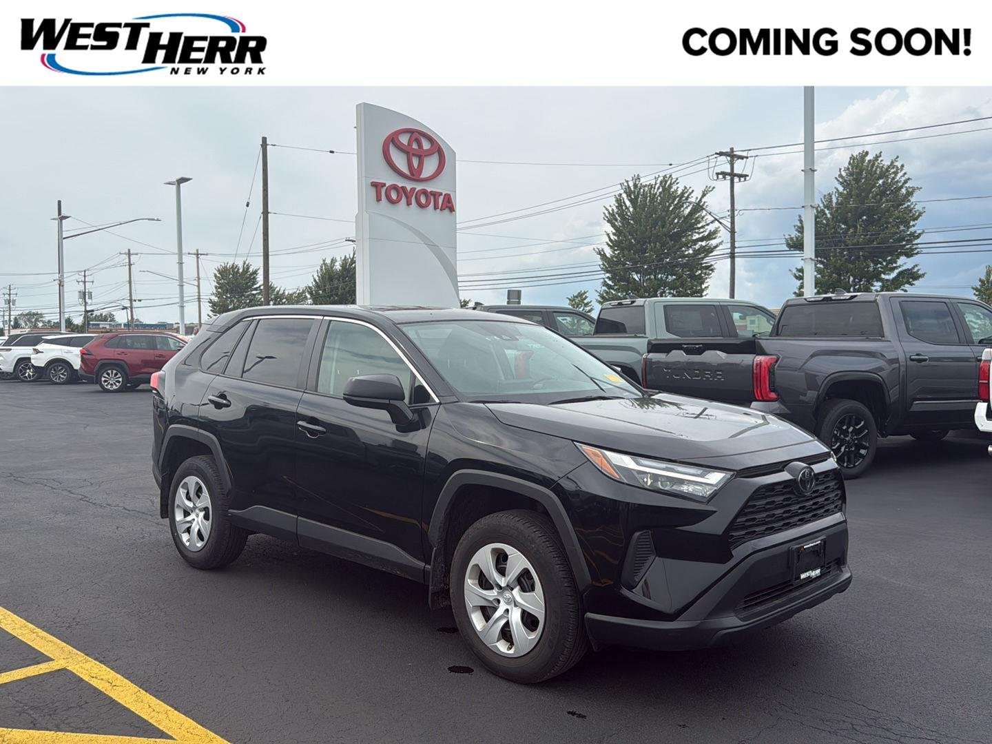 Used 2024 Midnight Black Metallic Toyota LE image 1