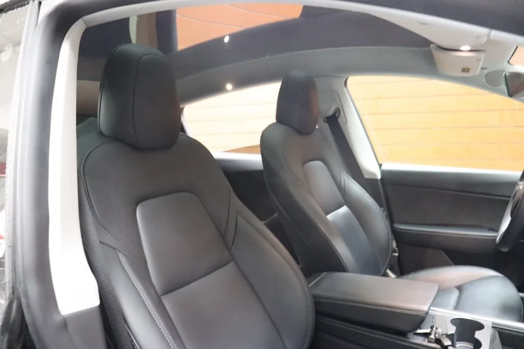 Used 2022 Solid Black Tesla Performance image 54