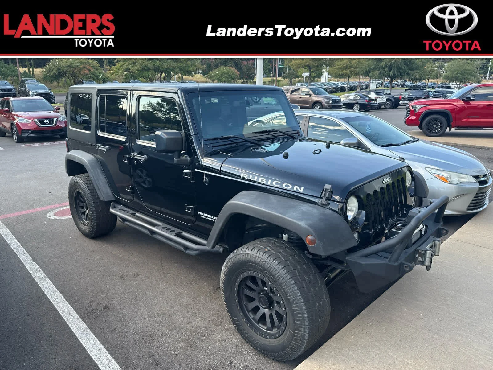 Used 2015 Black Clearcoat Jeep Rubicon image 1