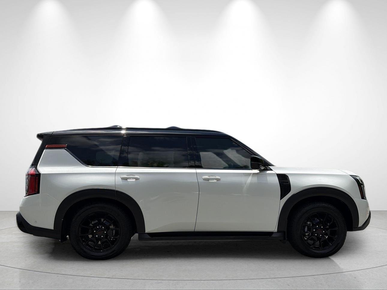 Used 2025 Aspen White Tricoat/Super Black Nissan PRO-4X image 6