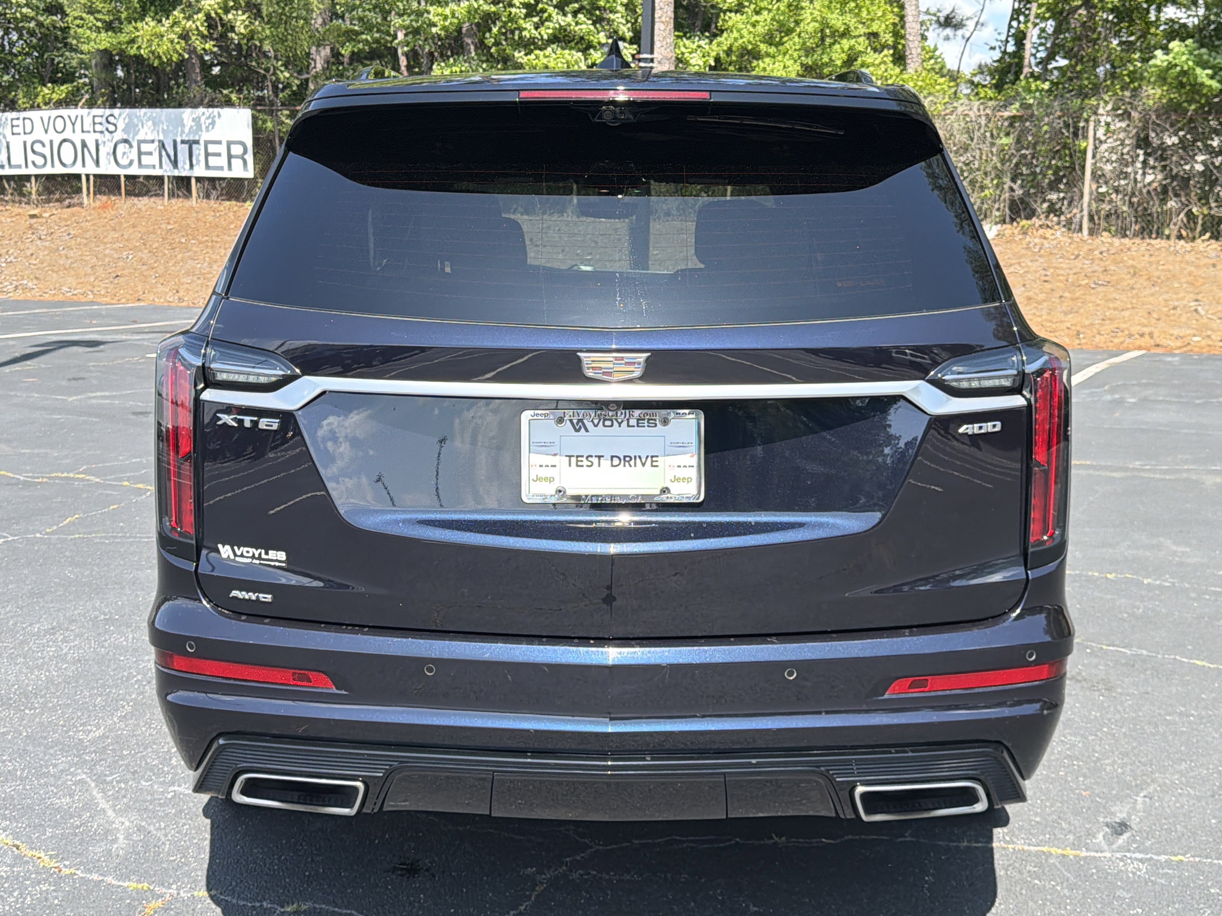 Used 2021 Dark Moon Blue Metallic Cadillac Sport image 8