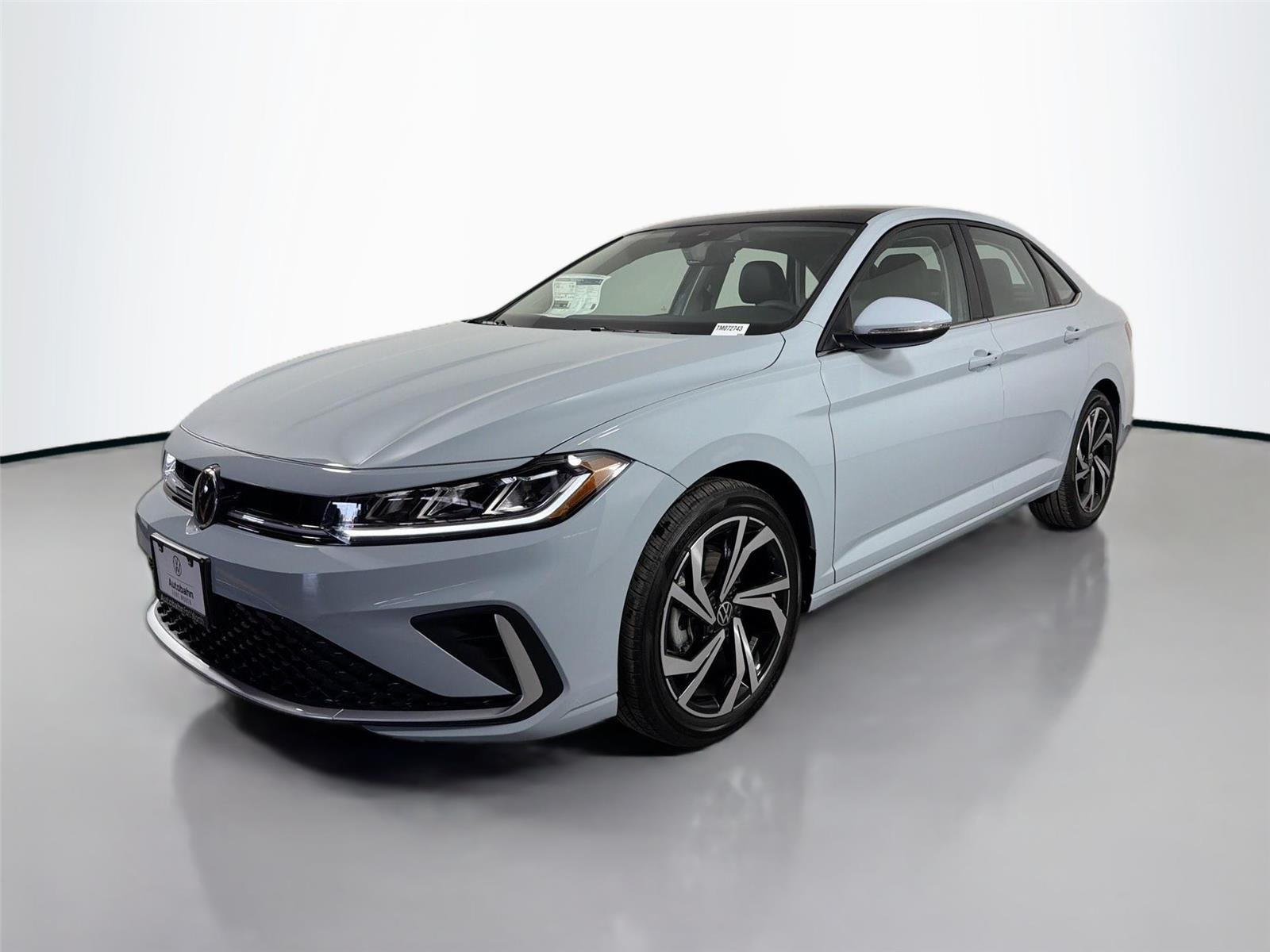 New 2026 Monument Gray Volkswagen SEL image 1