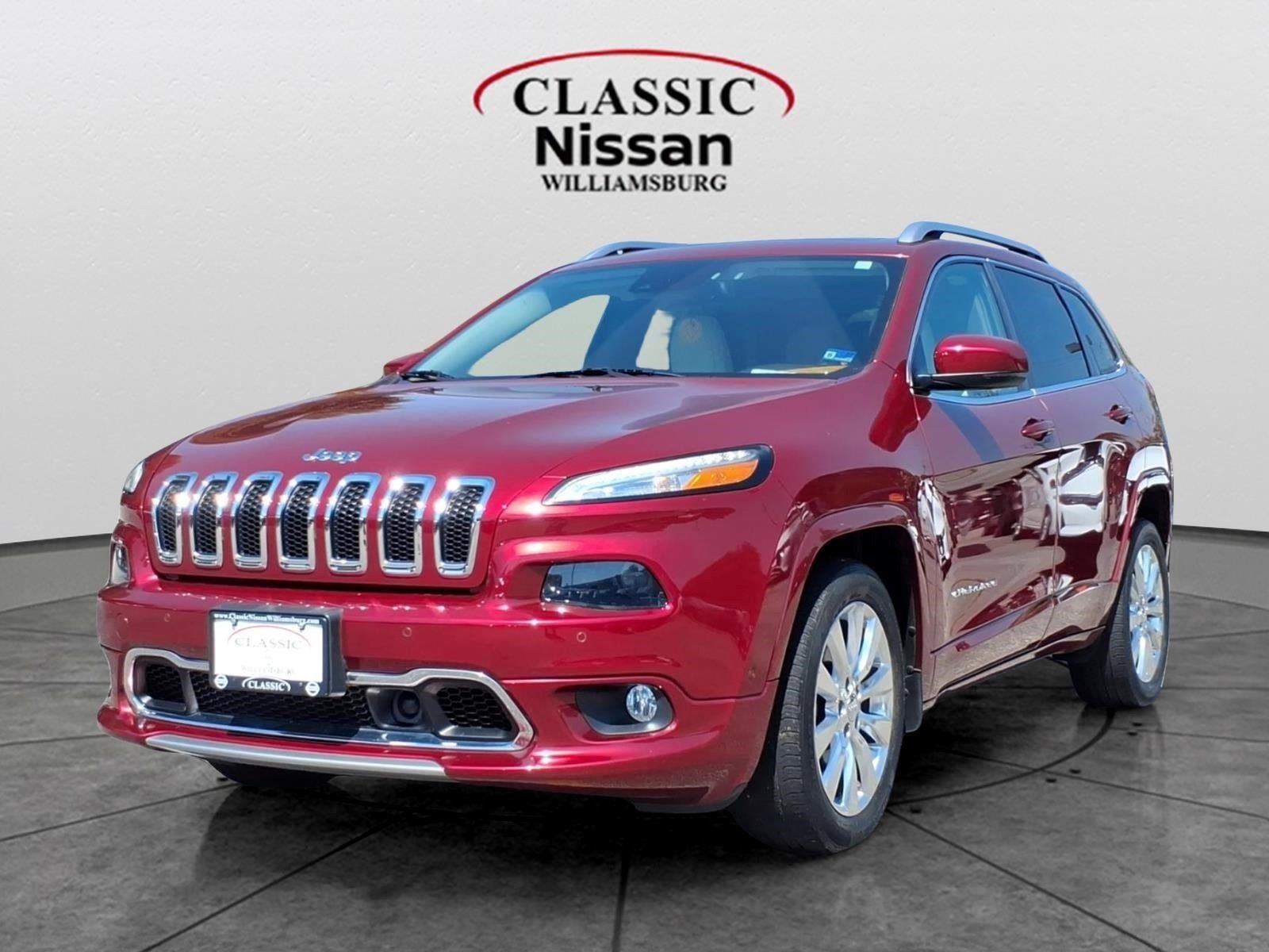 Used 2016 Deep Cherry Red Crystal Pearlcoat Jeep Overland image 1
