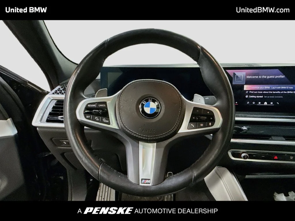 Certified Used 2025 Black Sapphire Metallic BMW xDrive40i image 13