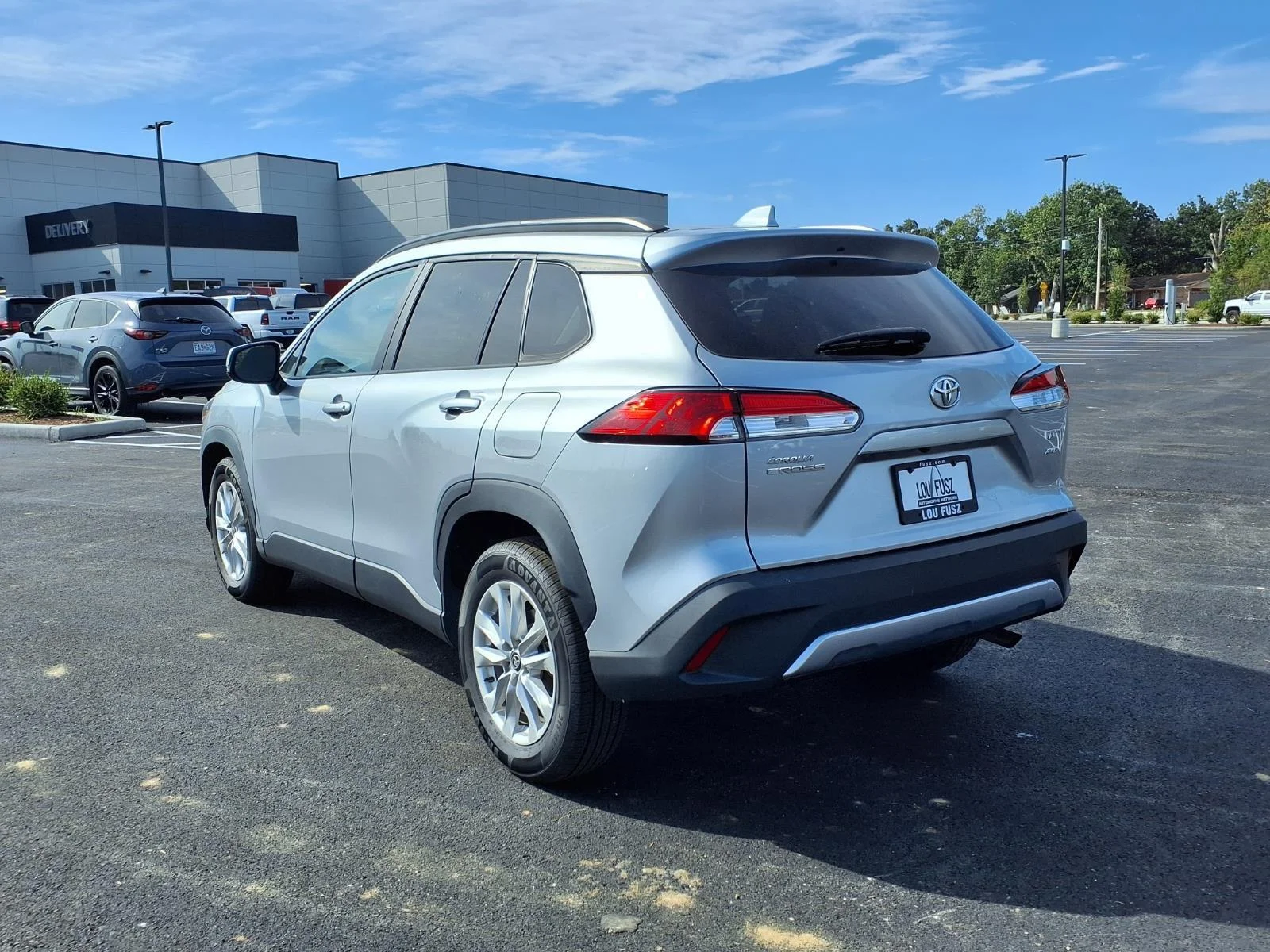 Used 2022 Sonic Silver Toyota LE image 24